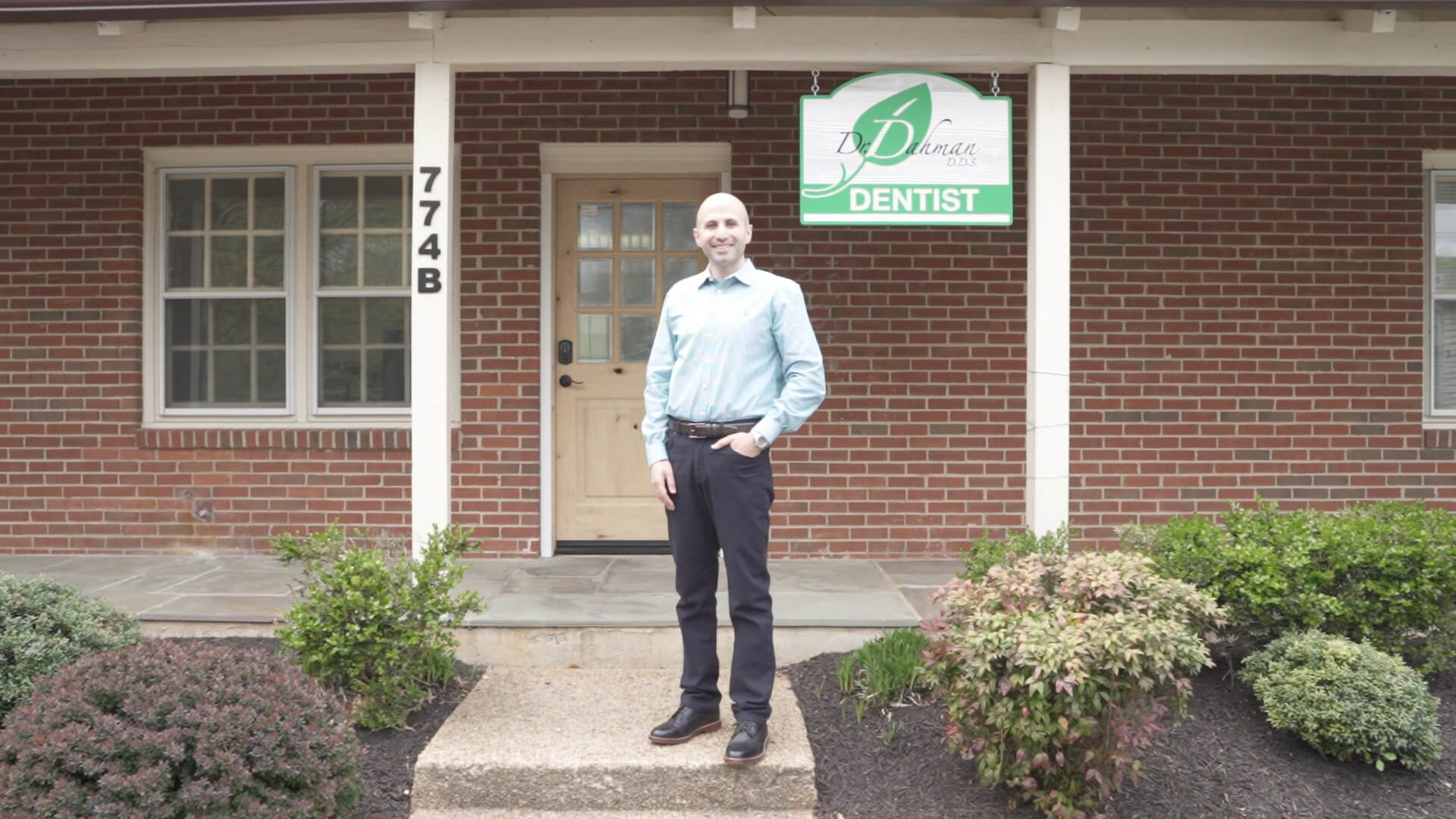 Dr. Dahman standing outside of the practice