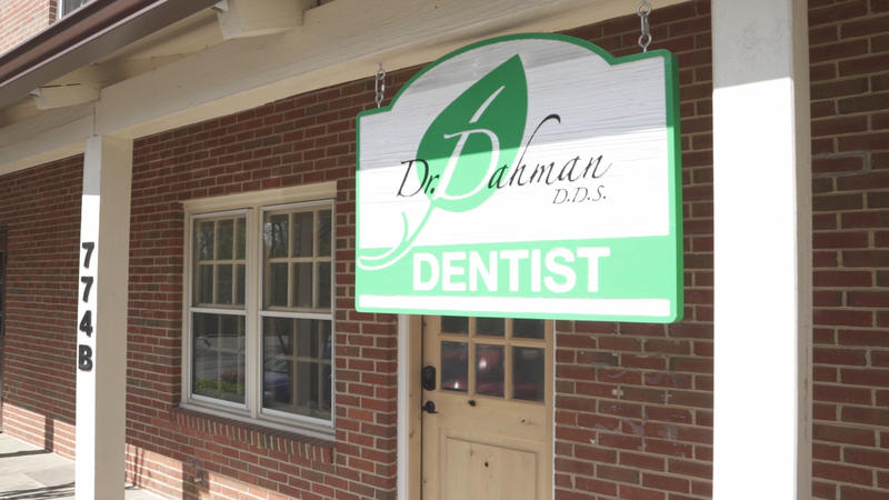 Our front door and sign with our leaf logo