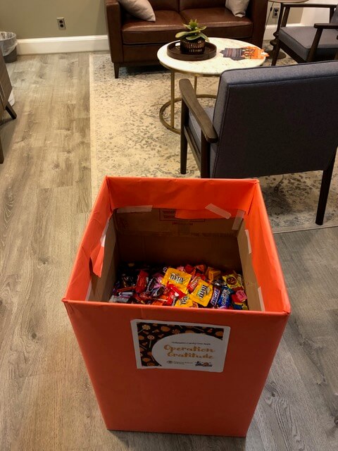 Seventy pounds of candy in an orange box
