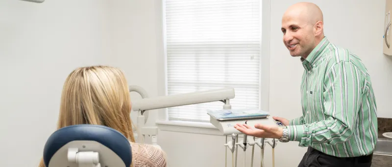 Dr. Dahman with a patient