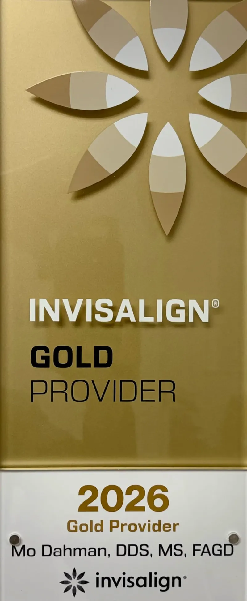 A glass award for Mo Dahman, DDS, MS, FAGD - 2026 Invisalign Gold Provider