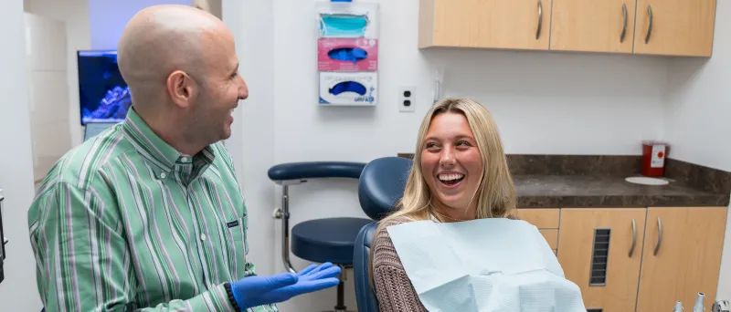 Dr. Dahman laughing with patient