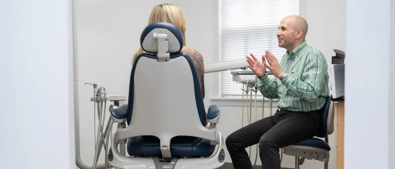 Dr. Dahman discussing with a patient